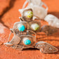 Tap Saddle hat pin